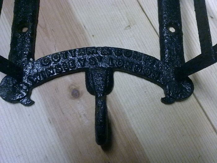 Old wall mounted stable harness holder