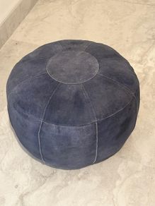 Two leather pouffes