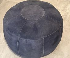 Two leather pouffes