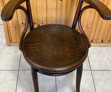 Antique large seated bentwood arm chair