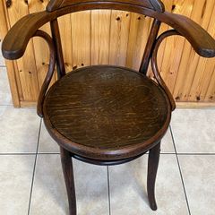 Antique large seated bentwood arm chair