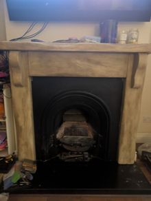 Fireplace surround and cast iron insert