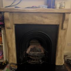 Fireplace surround and cast iron insert