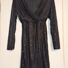 Stunning long sleeve sparkly midi dress from Kyla