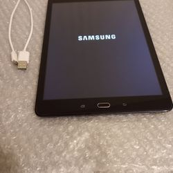 Samsung Galaxy Tab A with charging cable