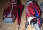 Golf bags and some golf clubs