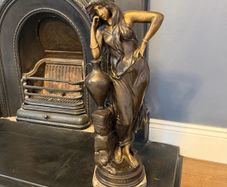 Large solid bronze figurine