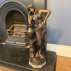 Large solid bronze figurine