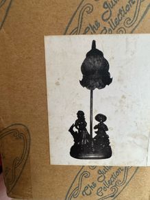 lamp metal girl/boy under glass shade. Brand new