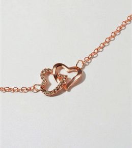 Rose Gold Bracelet with a Heart Charm