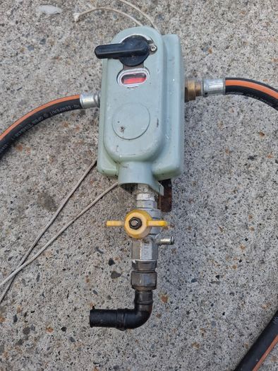 Propane switch over unit