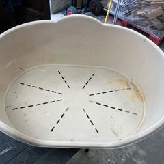 large plastic dog bed