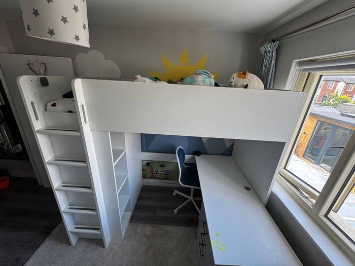 Bed with wardrobe and desk