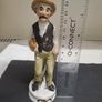 Vintage Porcelain Farmer Figurine with Bread 15cm Image 2