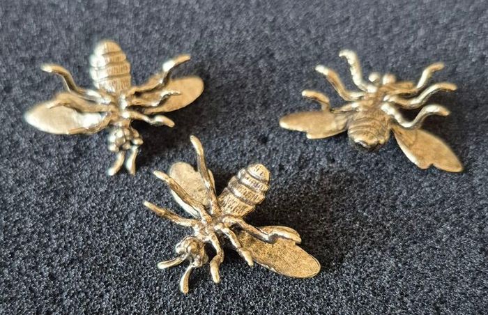 3 brass bees. Solid brass.