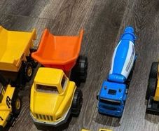 Selection of construction vehicles including CAT and JCB