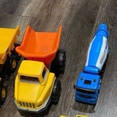 Selection of construction vehicles including CAT and JCB