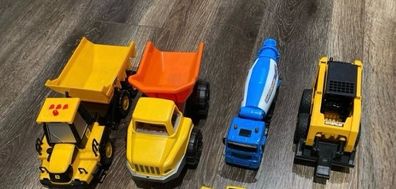 Selection of construction vehicles including CAT and JCB