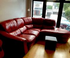 Red leather corner sofa
