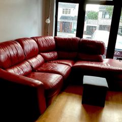 Red leather corner sofa