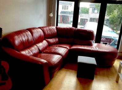 Red leather corner sofa