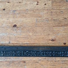 Cast iron fireplace fender