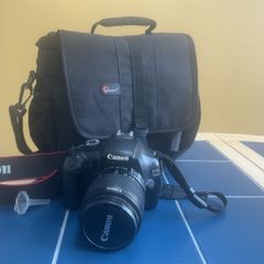 Canon EOS complete with camera bag.