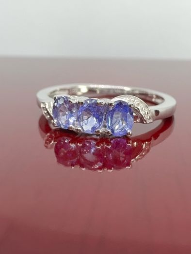 Silver Tanzanite Trilogy Ring in Platinum Overlay Sterling Silver.