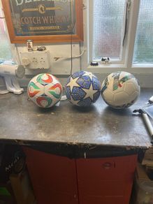 3 soccer balls