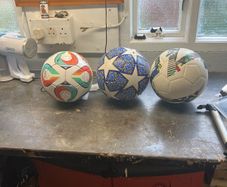 3 soccer balls
