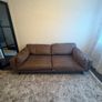Leather sofa with original harvey Norman tag still attached Image 2