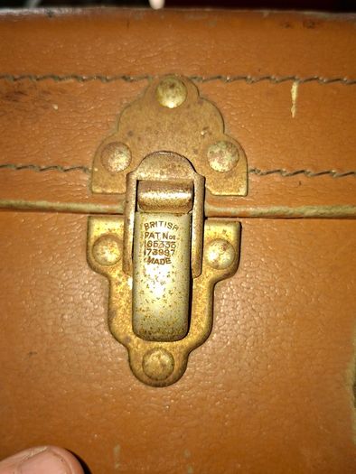 Vintage Hard Travel Suitcase, 1940s to 1950s, featuring a rigid textured brown exterior, metal corner guards, and a molded carry handle, Measurements are in the photo's, Postage Available or Collection