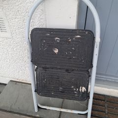Two-step folding ladder