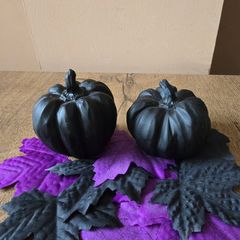 2 Pumpkins and some artificial leaves