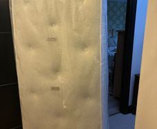 Single coil sprung mattress