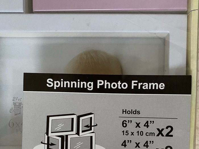 NEW SEALED Spinning Photo Frame - 4 pictures