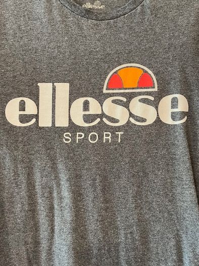 ELLESSE  T-shirt. Size small / medium. Great Quality & In Excellent Condition. Weighty 100% cotton.