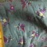 Green fabric with flower design Image 2