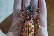 Beautiful brooch in the form of a large beetle with enamel and rhinestones.