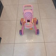 Musical pram/ high chair