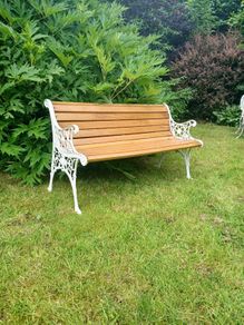 Cast iron and solid oak garden bench