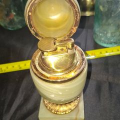 Beautiful Large Old Egg Shape Table Lighter with a Onyx Base and a Brass Mechanism, Postage Available