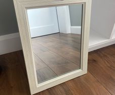 Mirror with boat detail