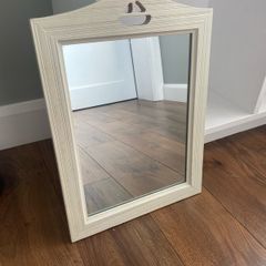 Mirror with boat detail