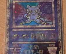 2000 Ancient Mew PROMO Damaged HOLO with 2 swirls