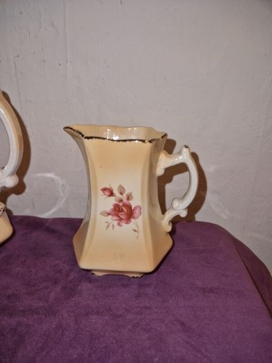 Antique pair of Rockingham Staffordshire floral jugs