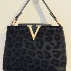 Black leopard print handbag with gold hardware