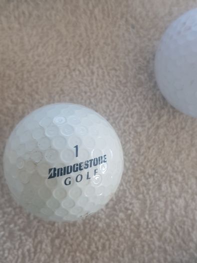 golf ball and tees