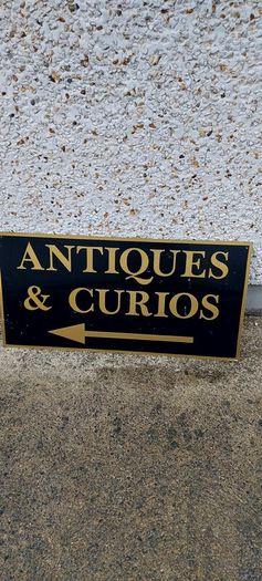 Antiques & Curios,hard plastic sign perspex. ,unusual and lovely colours,,32 inches length, 16 inches height,,buyer collects, see pictures for condition, used condition few marks nicks