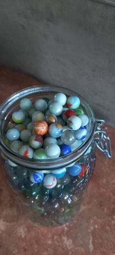 Antique collection of old marbles in large clip sealed jar it's full to the top loft find from very old house in France Beautiful